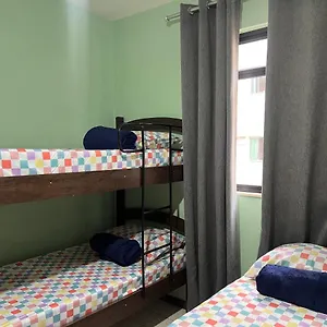  Quarto em Acomodações Particulares Casa Brasil